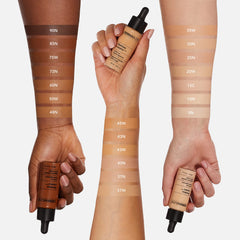 Dermablend foundation being blended with sponge demonstrating full coverage and smooth finish