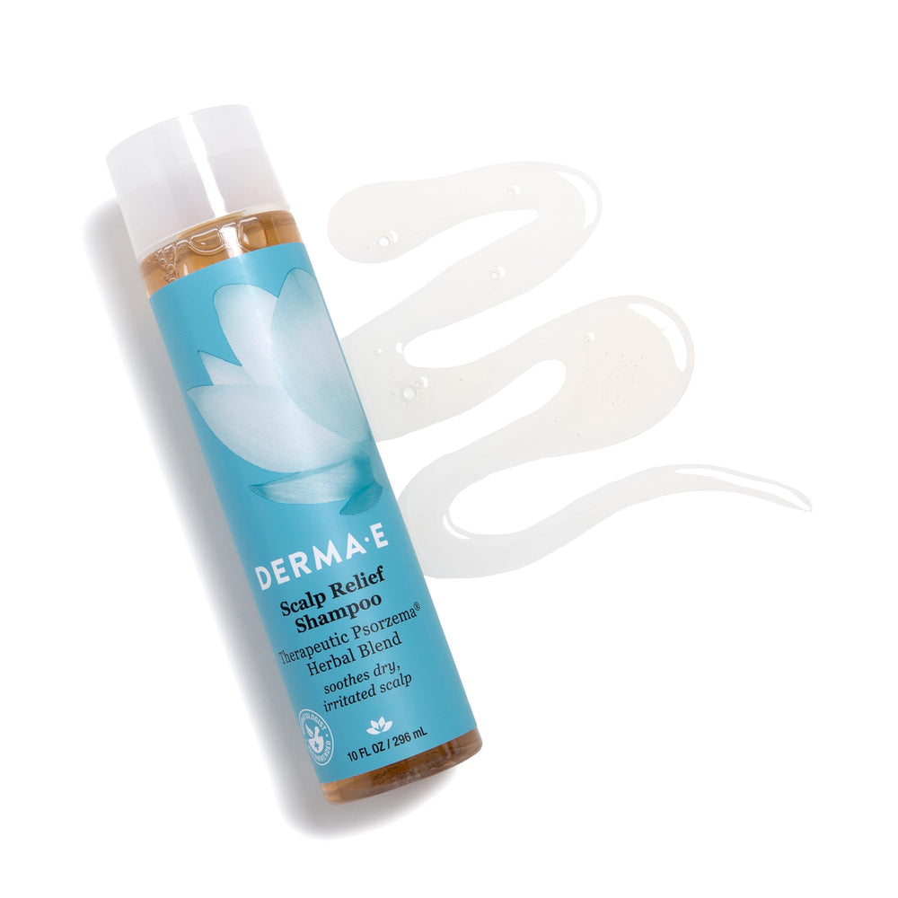 Derma E shampoo in hand showing bottle scale and travel-friendly benefit