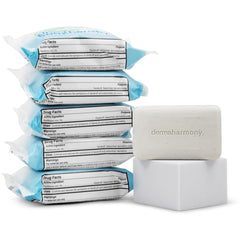 Dermaharmony 4 oz bar next to ruler showing compact travel-friendly size