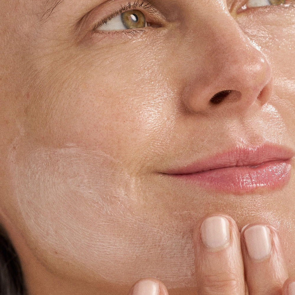 Dermalogica being applied to jawline and neck to show barrier repair benefit