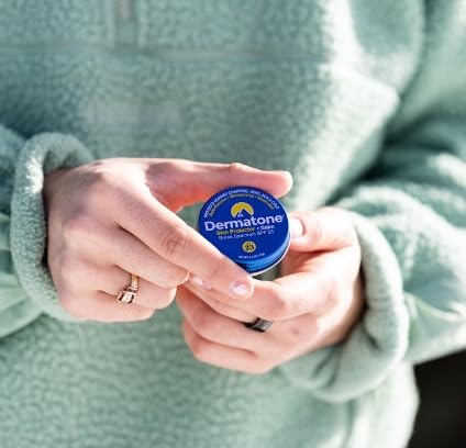 DERMATONE applied to lips offering portable SPF and chapping relief outdoors