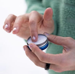 DERMATONE size comparison in hand demonstrating travel-friendly portability