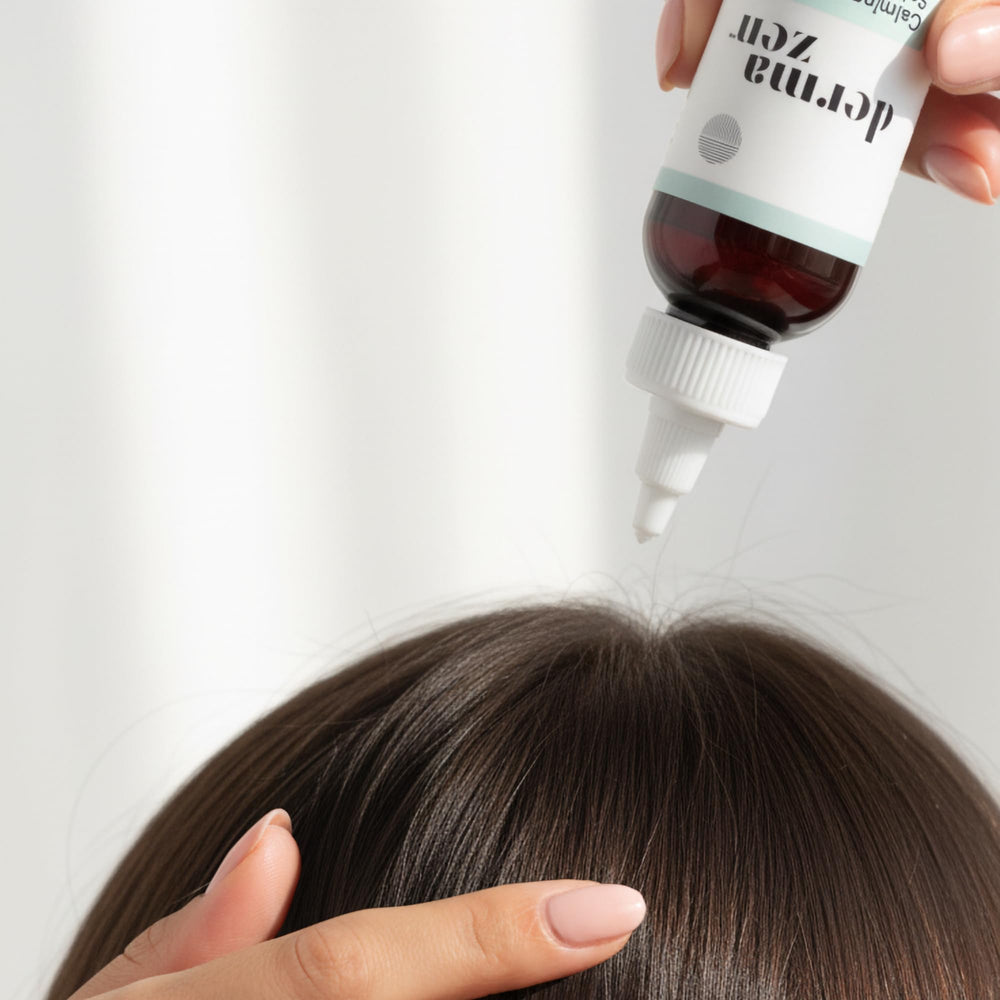 Dermazen serum being applied to scalp to calm flakes and reduce itch