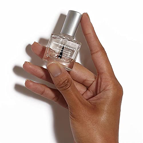 Dermelect brush applicator close-up delivering smooth, even coverage