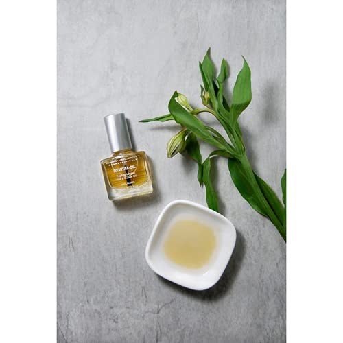 Dermelect brush applicator applying oil, enables precise cuticle treatment and control