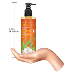 Desert Essence bottle placed beside sea kelp to show mineral ingredient benefit
