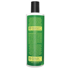 Desert Essence conditioner creamy texture on palm for easy detangling