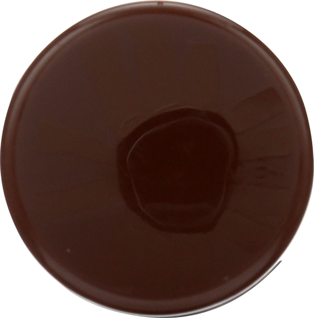 Desert Essence product label listing tea tree, aloe, jojoba benefits