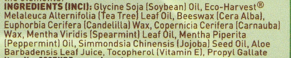 Desert Essence open applicator revealing wax stick for smooth application