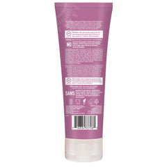 Desert Essence conditioner pouring to show smooth texture and quick absorption benefit