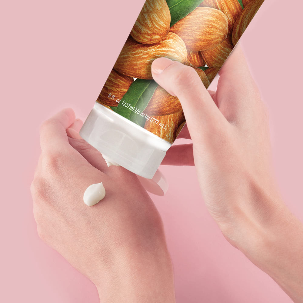 Desert Essence 8 oz bottle next to a common object, illustrates compact travel-friendly size