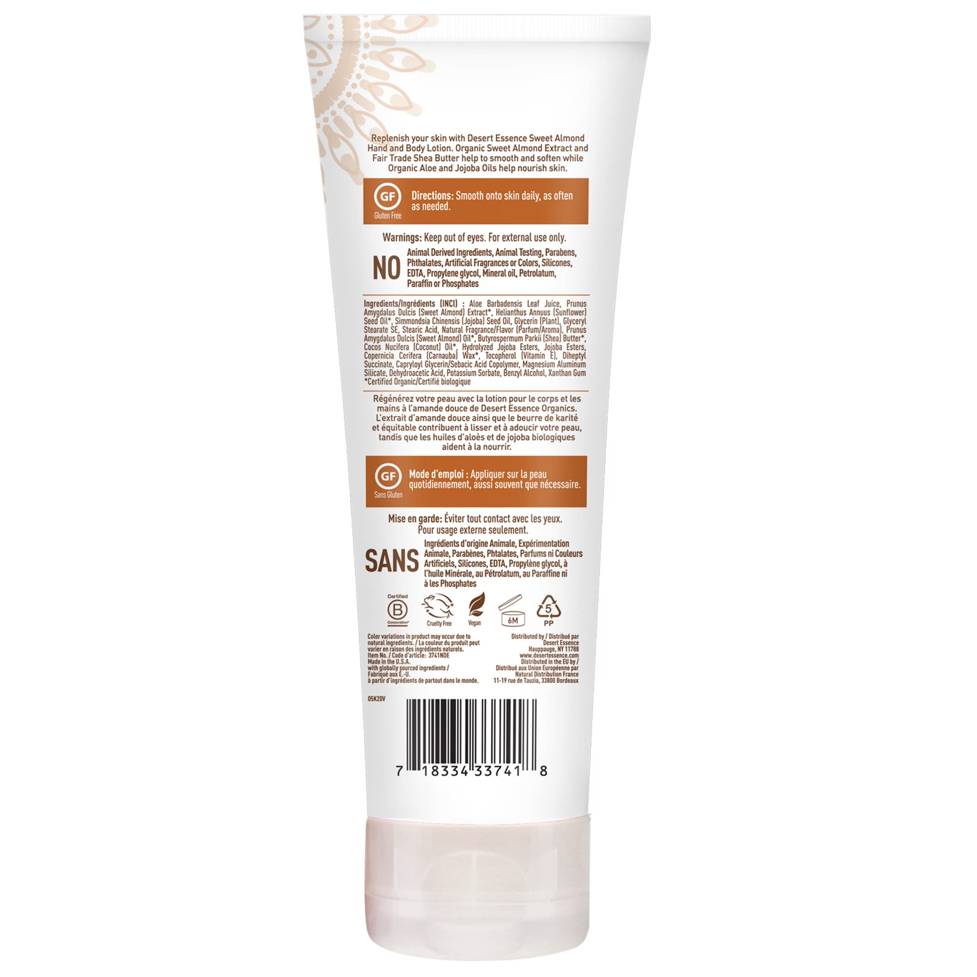 Desert Essence lotion texture on fingertip, shows lightweight absorption and smooth feel