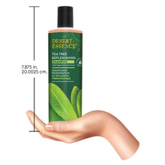 Desert Essence shampoo in shower setting suggesting refreshing use