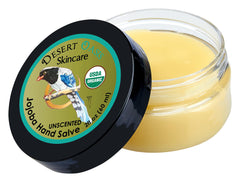 Desert Oasis Skincare applying salve to hands for instant conditioning benefit