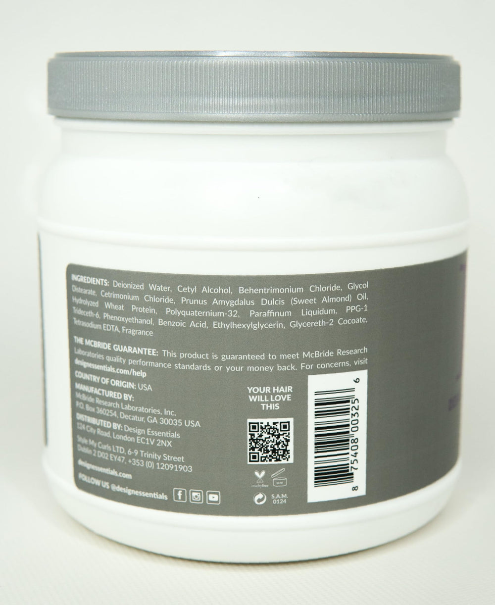 Design Essentials conditioner applied to hair in hand for easier detangling