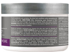 Design Essentials conditioner texture poured on hand highlighting moisture