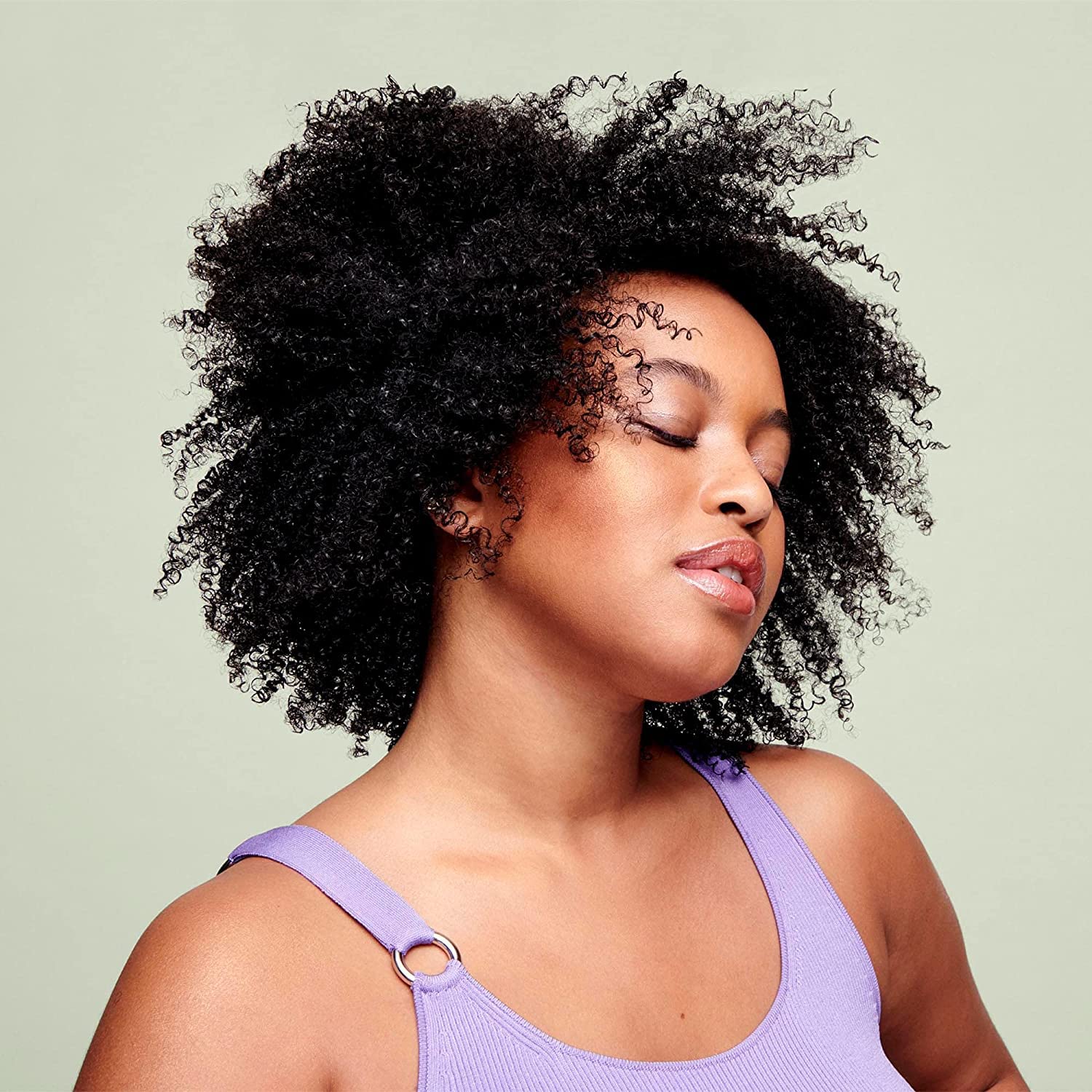 DevaCurl cream texture close-up showing moisturizing consistency for smooth curls