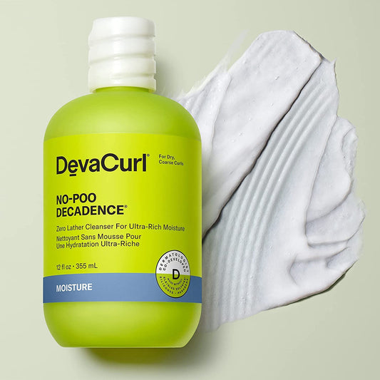 DevaCurl creamy product texture being poured to show moisturizing consistency