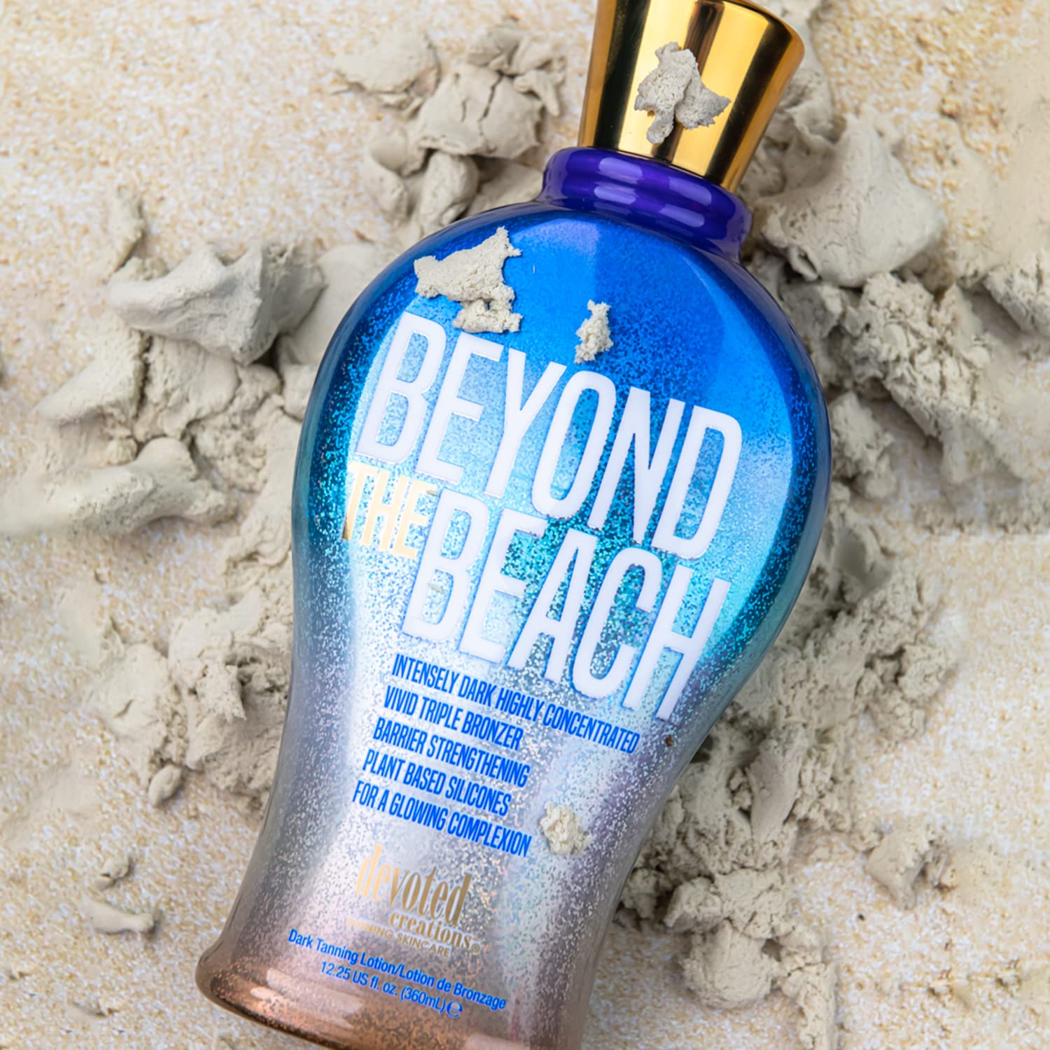 Devoted Creations label close-up highlighting GlowPlex, plant-based silicones and fragrance