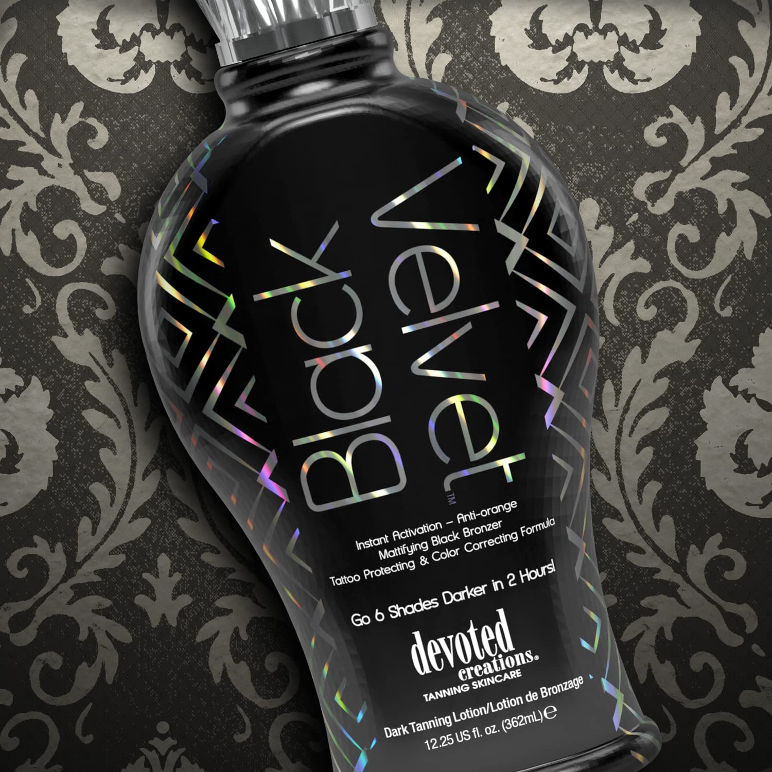 Devoted Creations bottle on vanity highlighting fragrance and luxury