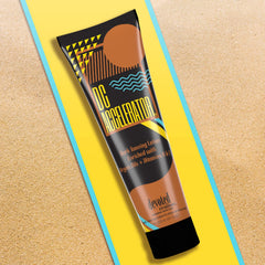 Devoted Creations bottle in sunlit setting suggesting warm fragrance and tanning support