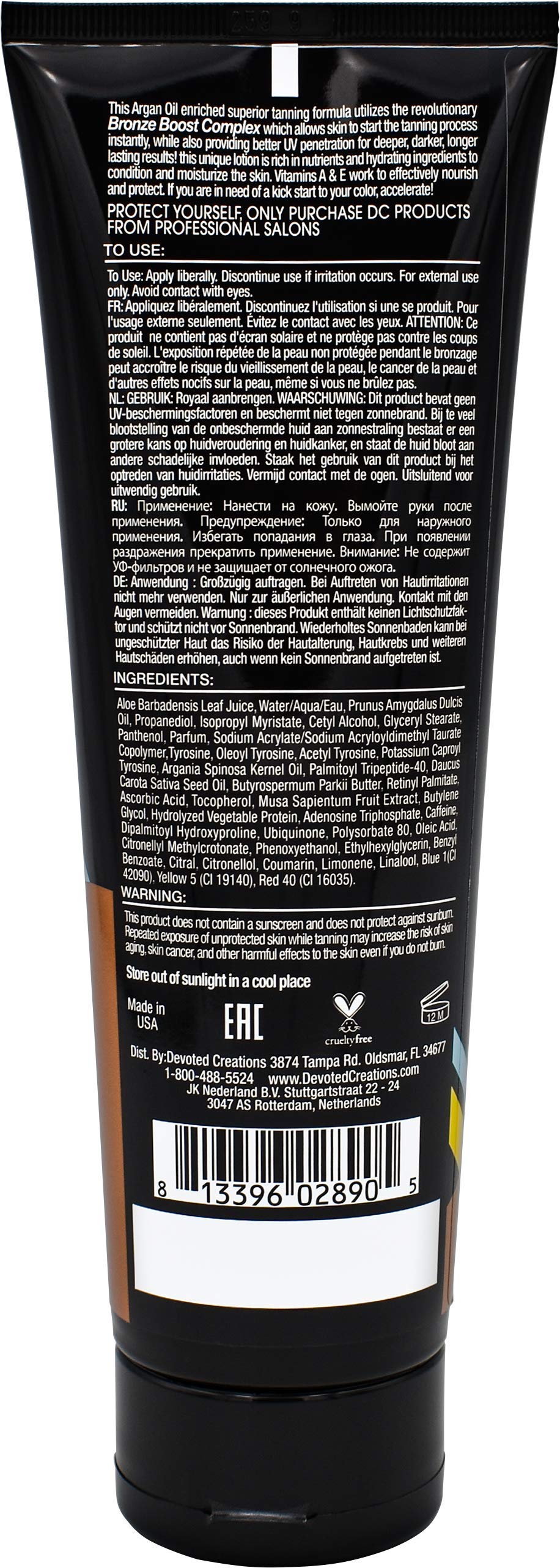 Devoted Creations lotion texture poured on hand highlighting argan-enriched moisturizing feel