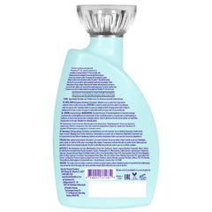 Devoted Creations bottle changing color under UV light demonstrating light activation benefit
