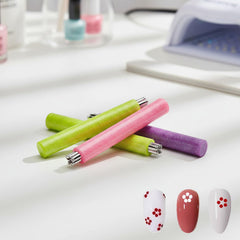 DFOBUNDO pen in use applying dots for fast salon-ready nail art