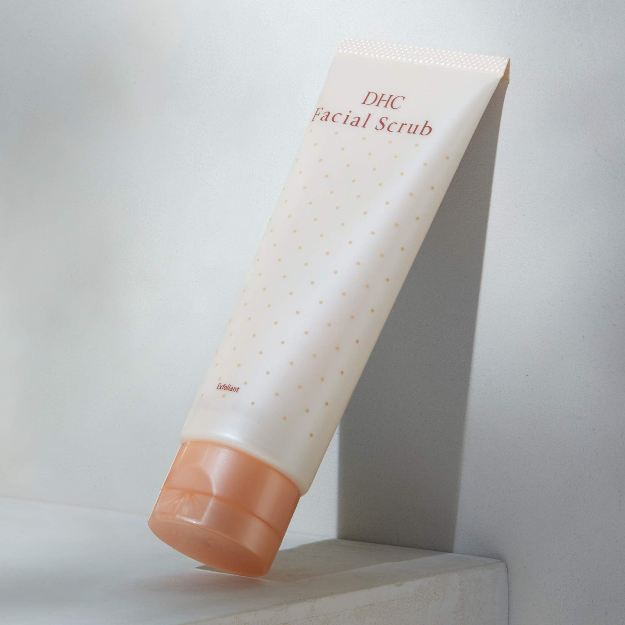 DHC facial scrub ingredient label highlighting soapnut and licorice benefits