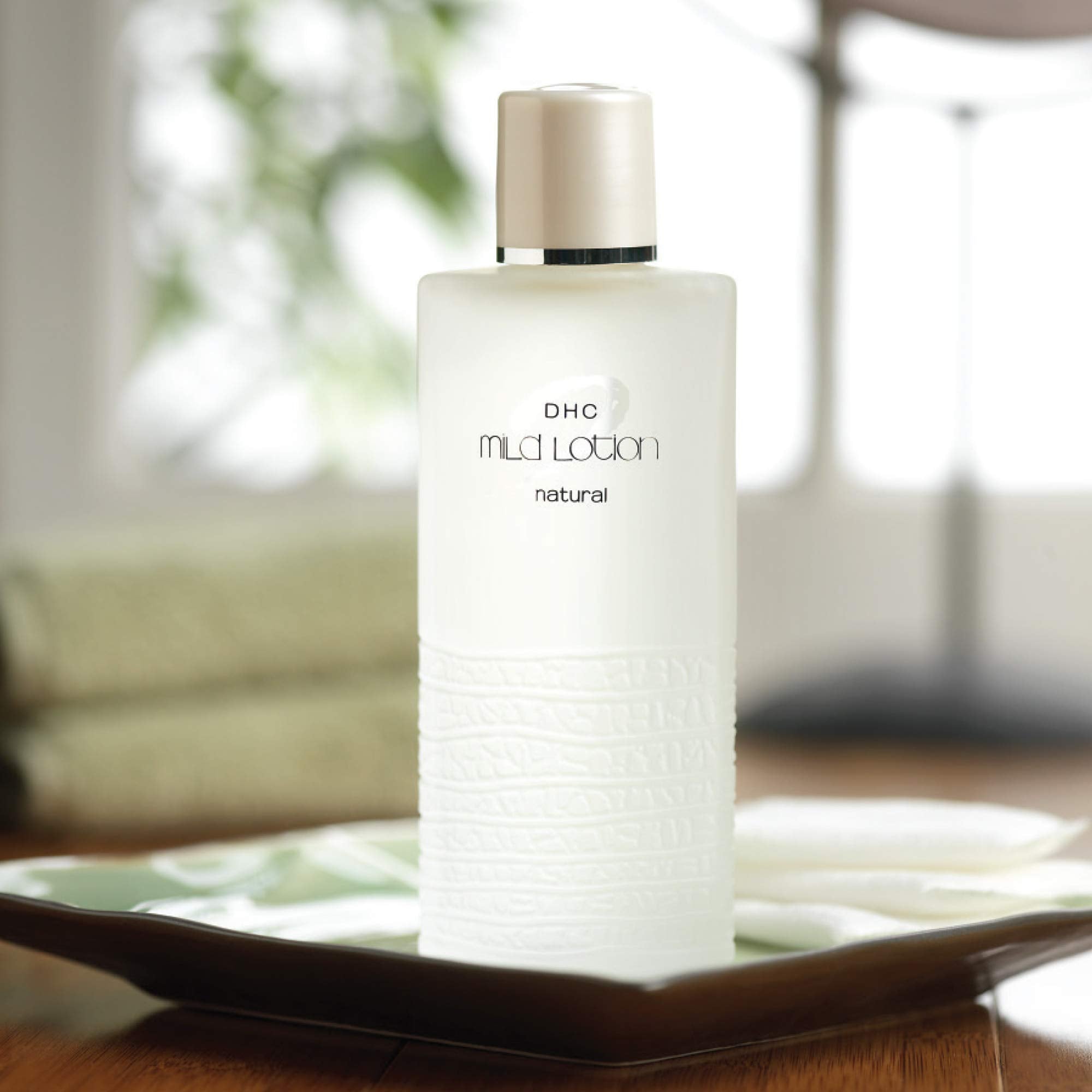 DHC mild lotion with cucumber ingredient visual emphasizing soothing botanical benefit
