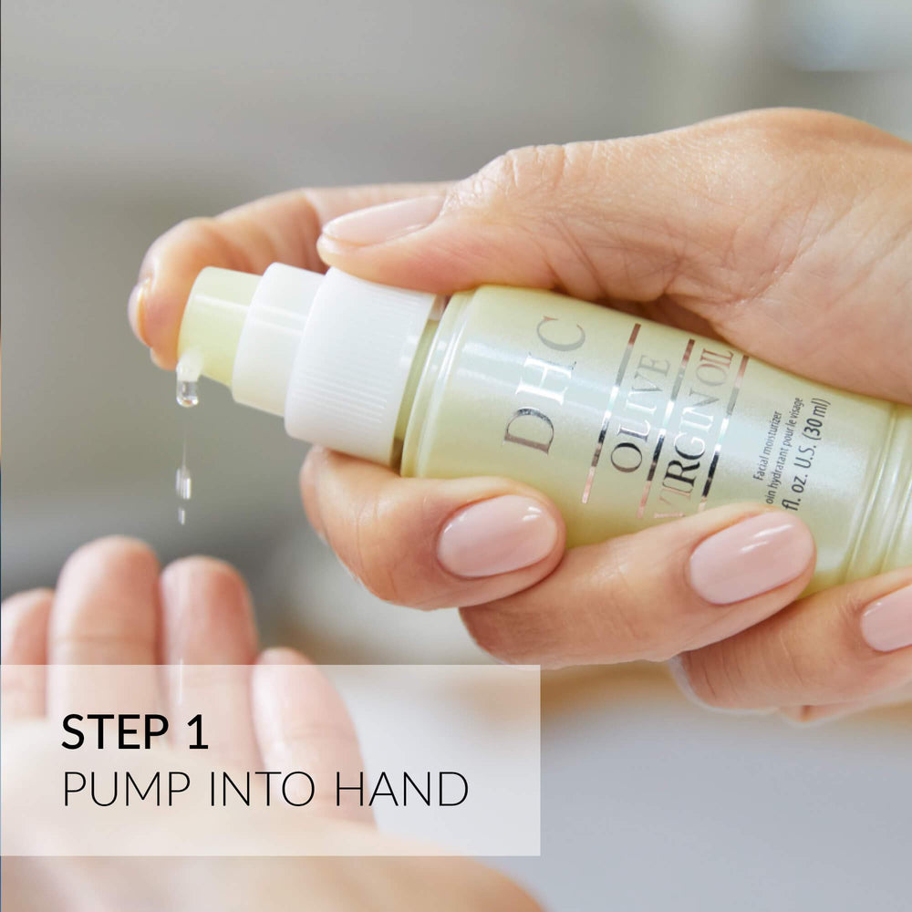 DHC oil on cuticles and hands showing nourishment and softened skin benefit