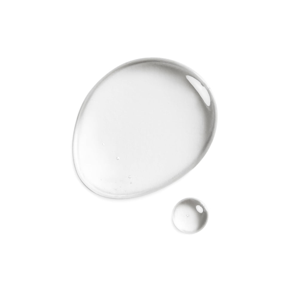 DHC applying oil to face demonstrating gentle hydration and glow benefit