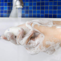 Dial bars on bathroom shelf lifestyle scene conveying everyday freshness