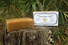 Diamond G turpentine soap in hunter's hands outdoors showing cover-scent use benefit