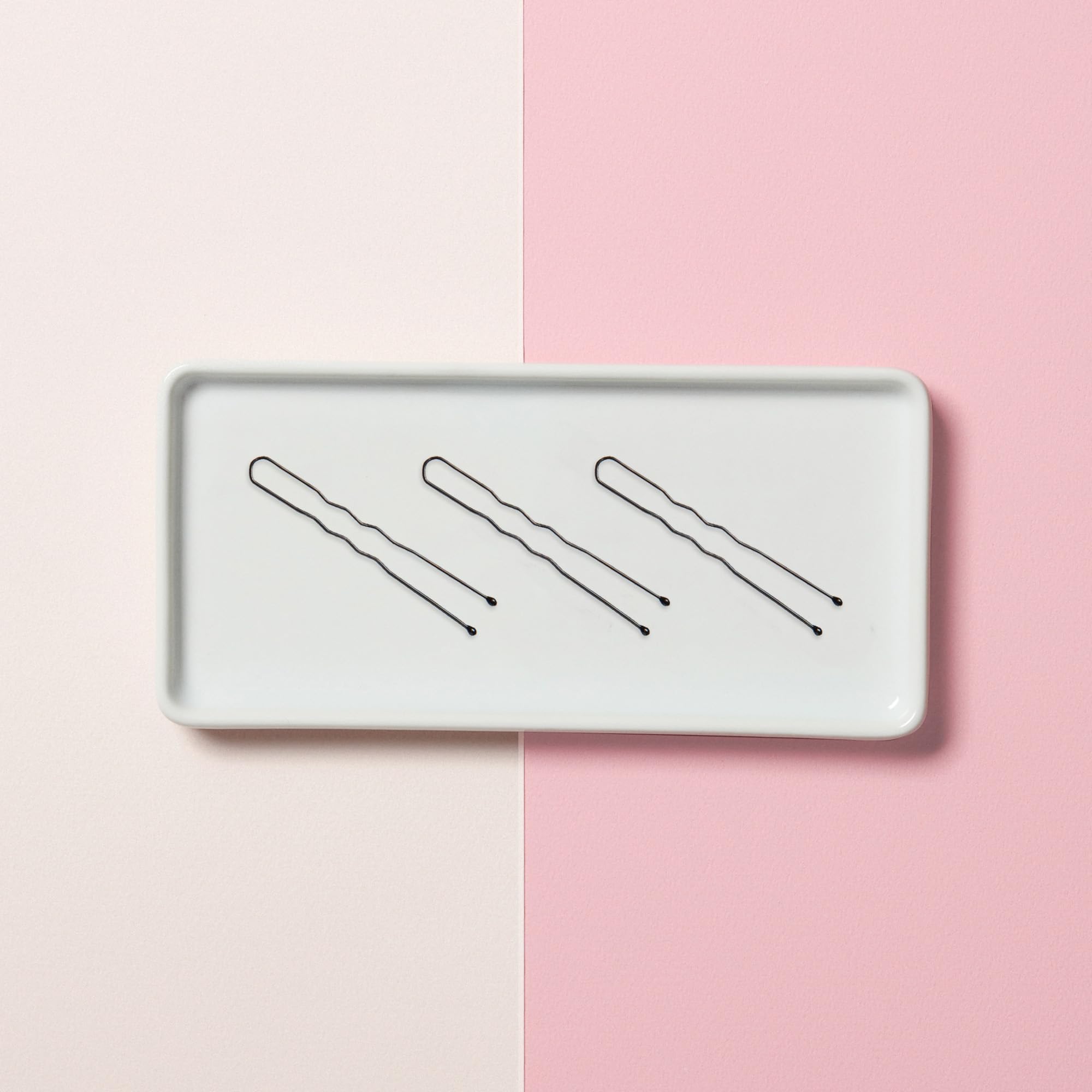 Diane pins next to ruler showing 1.75 inch length and 300-count supply