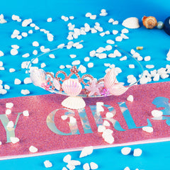 Didder sash close-up showing glitter texture and clear lettering