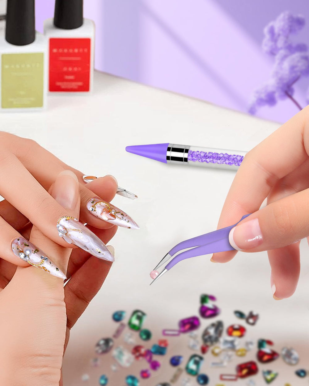 Difenni tools being used to apply rhinestones on a nail design