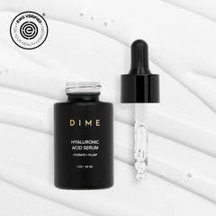 DIME dropper dispensing serum drops to control dosage