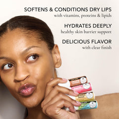 Dionis lip balm next to coin showing compact size for portability