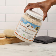 Dirty Treasures jar on towel in spa setting showing calming ritual benefit