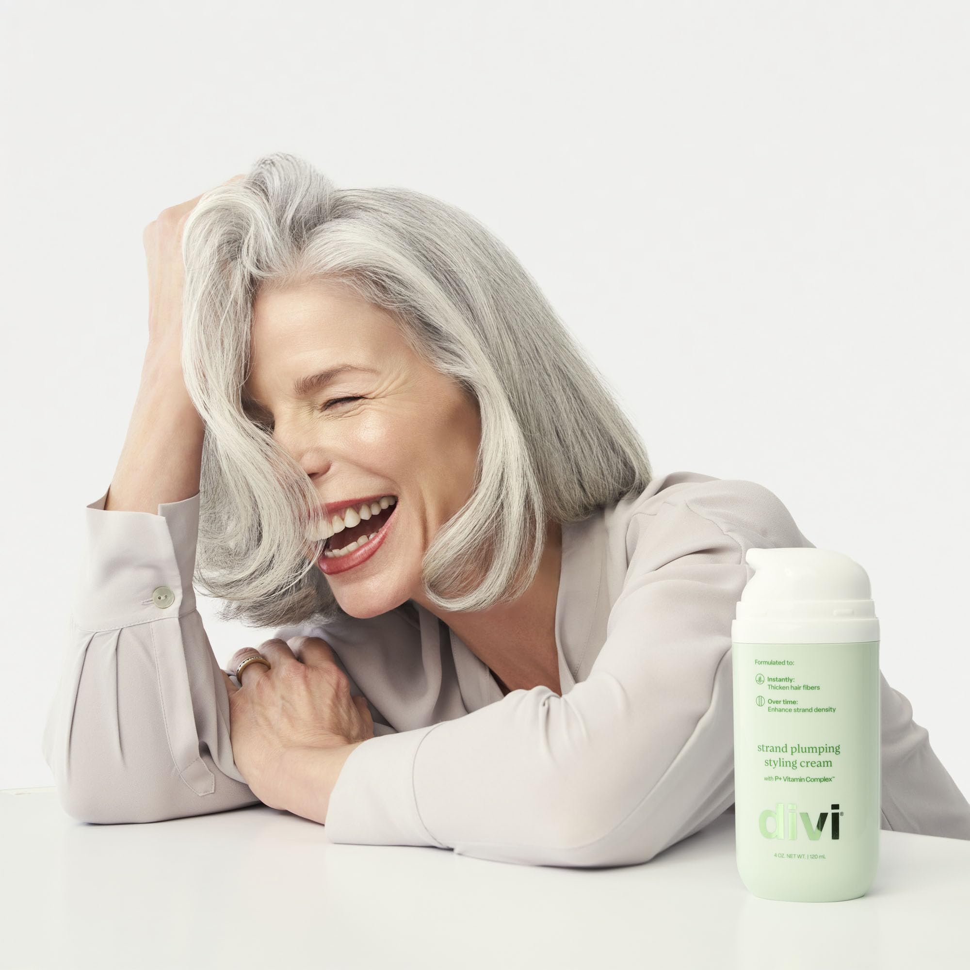 divi smooth hair finish closeup showing frizz control and shine