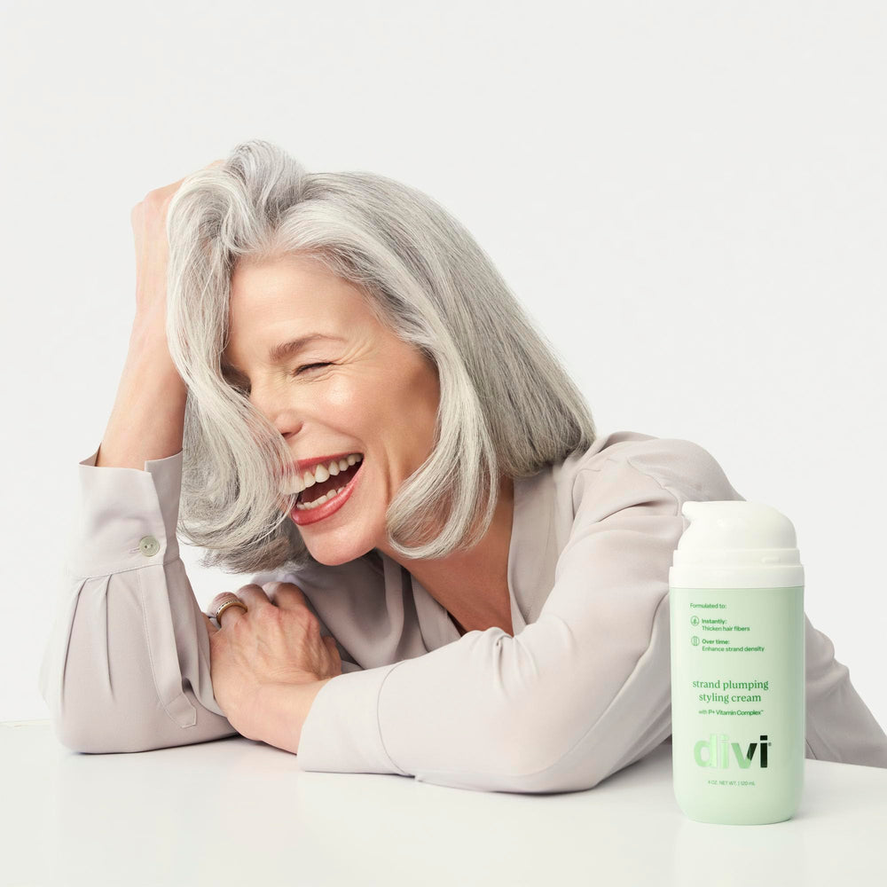 divi smooth hair finish closeup showing frizz control and shine