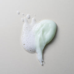 Divi in-shower use showing hands applying product for effective cleansing