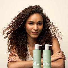 Divi scale comparison next to everyday item to demonstrate bottle size