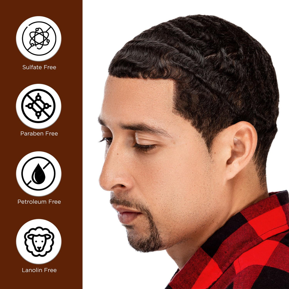 Applying Dixon's 1737 into curly hair with fingers for detangling benefit