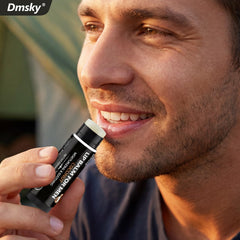 Dmsky open cap detail revealing balm tip and smooth application benefit