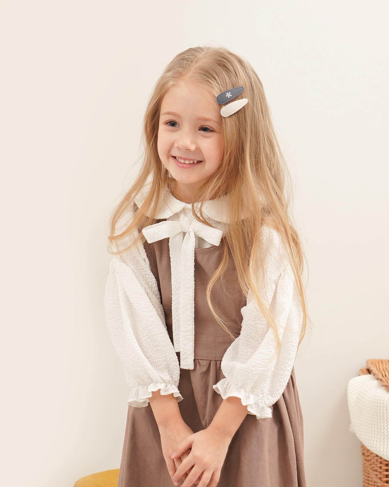 doboi floral clips secured in toddler hair keeping bangs clear and comfortable