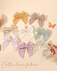 doboi child wearing a bow outdoors showing durable hold during play and good visual appeal
