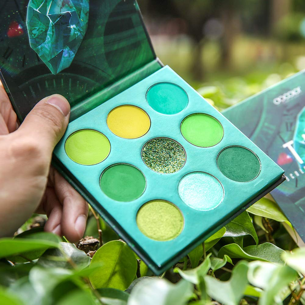 docolor palette next to a phone to show compact size and easy portability