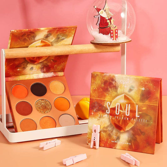 docolor open palette showing nine pans with mattes and shimmers for versatile looks
